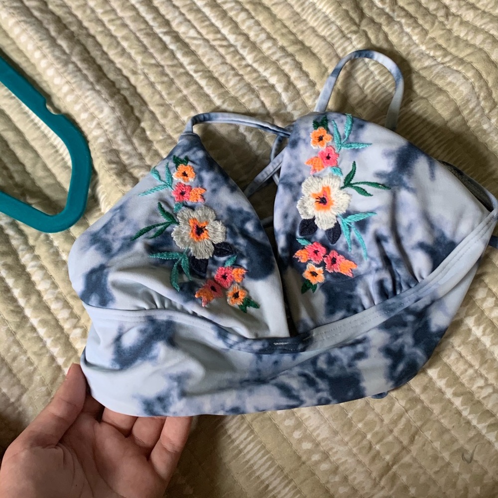 Light blue tie dye bikini top with flower detail